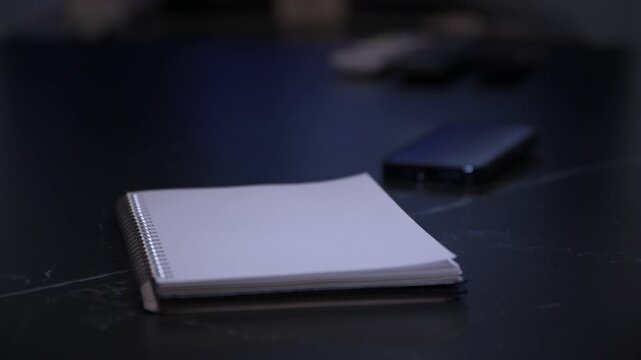 4K horizontal footage of lined notebook on the table