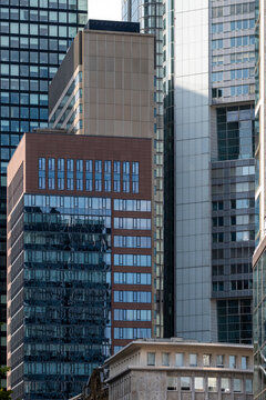 Frankfurt Germany finance business corporate skyscraper architecture office modern downtown red brick building contrasting glass highrise in district