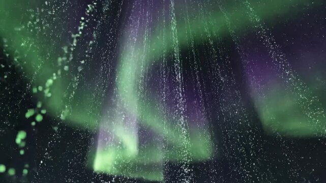 green and purple aurora particle pillars rising over starry sky, cascading luminous particles and vertical beams, ambient northern lights simulation, animator visualizing atmosphere dynamics,
