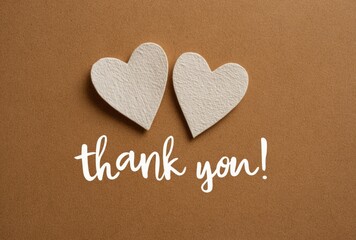 Heartfelt Thanks: Two Paper Hearts and 'Thank You' on a Warm Brown Canvas
