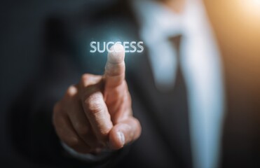 Businessman Touching Virtual Success Button: A Symbol of Achievement and Digital Innovation