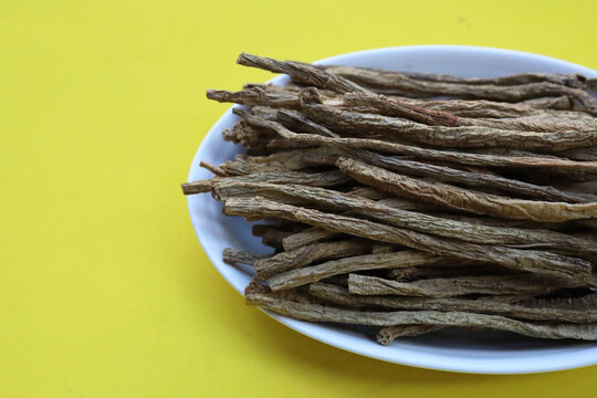 Dried brown Codonopsis root sticks used in Chinese herbal medicine.