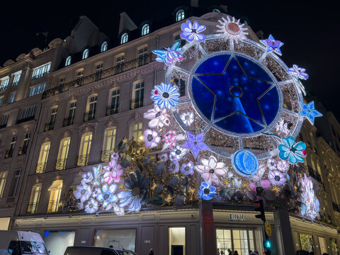 Paris, France &ndash; January 1, 2026: Dior boutique fa&ccedil;ade decorated for Christmas, highlighting festive window displays and luxury retail traditions in the French capital during the holiday season.