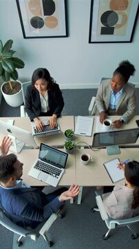 Synergistic efforts in offices cultivate groundbreaking solutions and ideas - Engaging discussions and collaborative planning generate innovative insights and strengthen team unity
