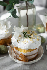 Traditional Easter cakes and painted eggs in white colors .Easter Kulich 