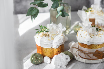 Traditional Easter cakes and painted eggs in white colors .Easter Kulich 
