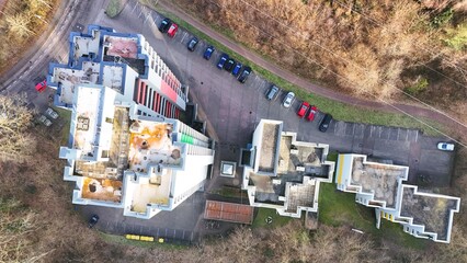 Top-Down Aerial View of Residential Apartment Complex With Parking Area