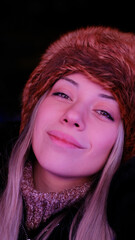 Beautiful blonde woman  with a caper smiling portrait