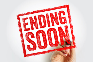ENDING SOON stamp, hand holding marker applying urgent notice, promotional deadline concept, limited time offer sign, marketing alert graphic for sales or campaigns