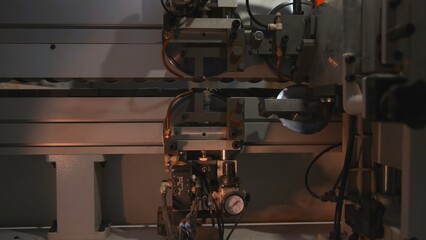 Detailed View Of Modern Equipment Performing Exact Metalworking Activities In Factory Setting. Media
