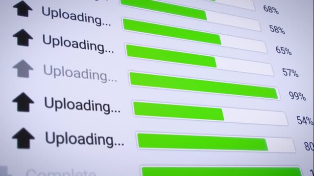 Video animation of the process of uploading multiple files from the Internet on a computer monitor screen. A computer monitor displaying information about the data upload in real time, including perce