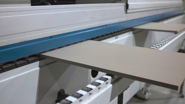 Precisionguided Conveyor Directs MDF Sheets Into Processing Machinery Seamlessly And Efficiently. Media