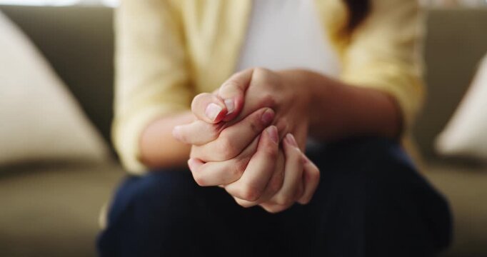 Nervous, hands and woman with anxiety at therapy for PTSD, trauma counseling or stimming with panic. Psychology, mental health or patient with fidgeting on sofa for worry or contemplating appointment