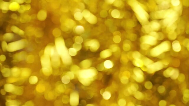 Abstract holiday background with gold glitter and bokeh effect. Christmas eve, new year and 4th of july holiday concept
