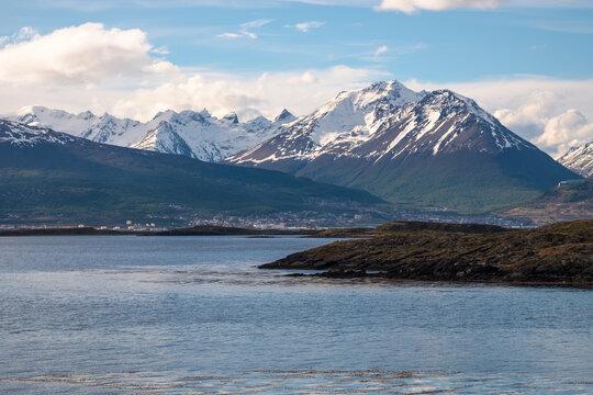 Beagle Channel, city center of Ushuaia and the mountains Sierra Vinciguerra and Cerro Esfinge in Tierra del Fuego, Argentina
