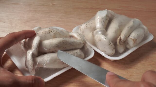 chef preparing mushroom for cooking ingredient