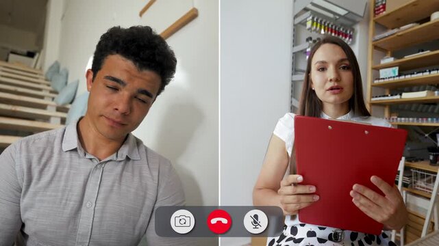 A man looks bored while talking with a woman online. Both are engaged in a work meeting. The man takes notes while the woman shares ideas.
