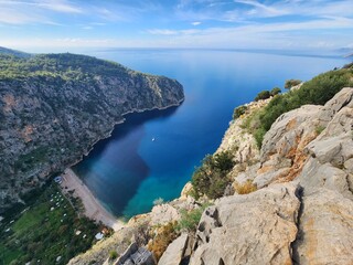 T&uuml;rkiye, Antalya, Andifli, the Lycian Way. Picturesque view of the bay from the hiking trail. Rocks and sea.