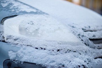 Details of cars frozen in calamity ice on street of European city Prague