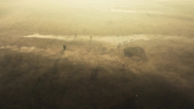 Aerial View Of Epic Dawn Mist over Central Highlands Landscape in Krong Nang, Dak Lak
the dramatic topography of Vietnam's Central Highlands. Watch as the morning sun burns through thick layers of fog