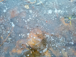 a frozen lake in a cold winter day