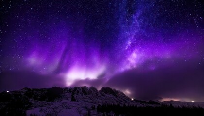Fototapeta premium Majestic Aurora Borealis Display Over Snow-Capped Mountains Under Starry Night Sky.