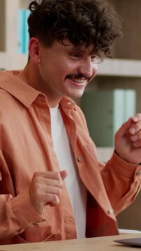 Happy Caucasian business man typing laptop dancing celebrating online winning businessman working computer dance listening music rejoice internet win victory achieve guy male work success in office