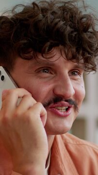 Caucasian business man talking mobile phone smiling male guy startup owner businessman talk smartphone answer call friendly discuss work project speaking cellphone smile speak leader agent in office