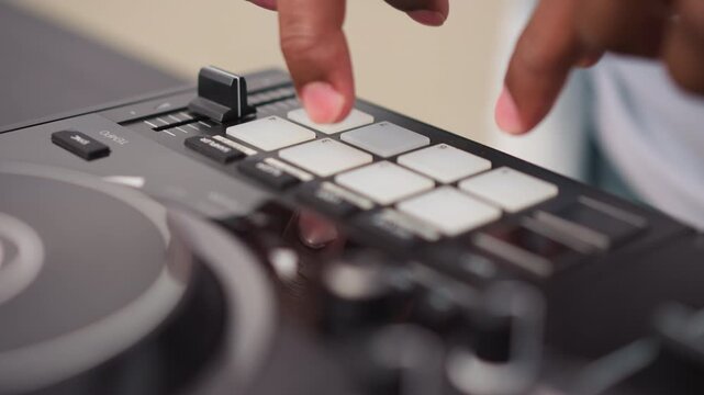 Closeup black hands on DJ pads, triggering sample loops and scratch textures during energetic street set, urban backdrop, dynamic camera angles, palpable party energy and crowd vibe