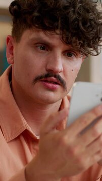 Caucasian business man typing mobile phone chatting smartphone app serious businessman guy male worker manager chatting social media using web application specialist scrolling cellphone in office