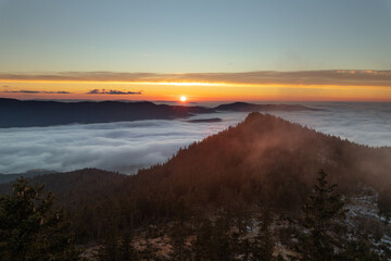 Obraz premium sunset over the sea of clouds in Sumava