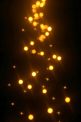 Glowing Christmas tree lights and abstract stars create a bright holiday background design with orange flame textures and shining firework particle energy in motion