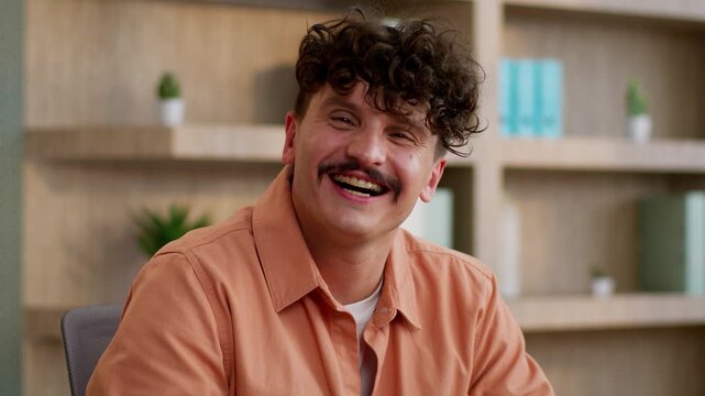 Portrait smiling business man laughing Caucasian businessman laugh good mood looking at camera in office male employer guy having fun reaction fooling smile joyful happy enjoying work job working