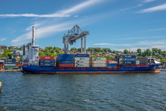 Moss, Norway - July 09 2024: full view of container ship at port.