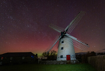The most amazing aurora over a mill on  Anglesey