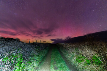 The most amazing aurora over Bull Bay Village and fields on  Anglesey