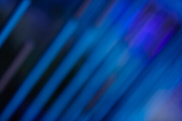 A soft blue abstract background features a digital motion blur design with colorful pink waves and glowing lines to create a light textured wallpaper concept