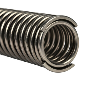 Close-up of steel industrial spring, metallic compression coil isolated subject.