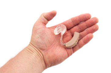 Hearing aid with transparent custom earmold in a human hand, isolated on transparent background (PNG)