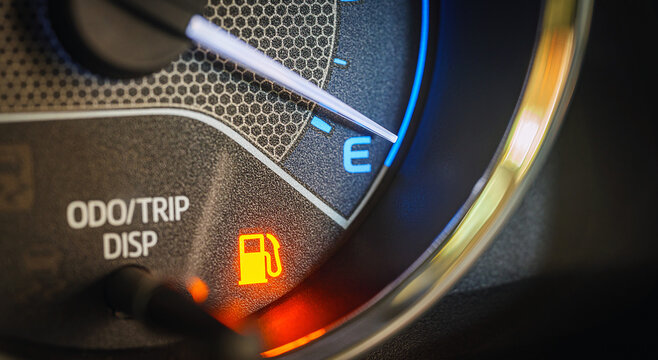 Low Fuel Warning Light on car Dashboard Display