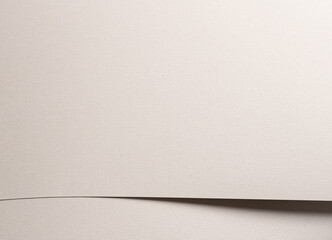 Fototapeta premium Warm white textured paper background with horizontal edge and calm geometry. Matte surface with