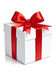 Obraz premium A beautifully wrapped gift box in white with a vibrant red ribbon and bow on top, perfect for celebrations
