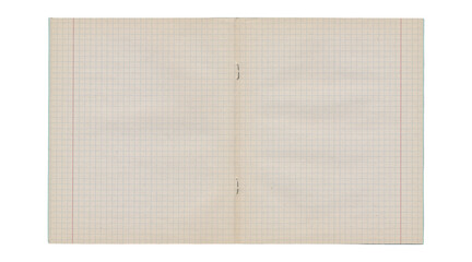 Worn open notebook graph paper spread with torn center and stains