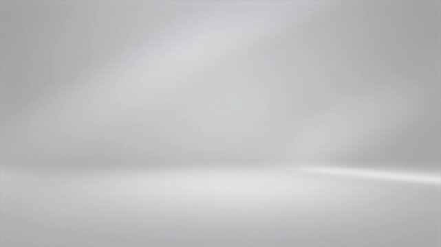 A simple studio setting with a clean, smooth gradient background that shifts from light to dark tones.  The floor appears bright white