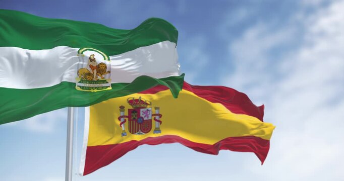 Flags of Andalusia and Spain waving together