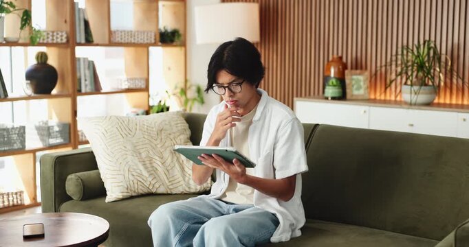Work from home, thinking or man with tablet for planning, scroll email feedback or system update idea. Review, reflection or Asian person with tech for maintenance, brainstorming or website revision