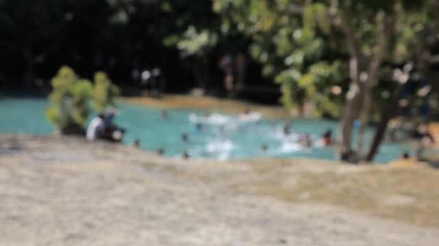 The emerald pool or Sra Morakot at the Prabangkram wildlife safety park (Krabi, Thailand).Blurred view.