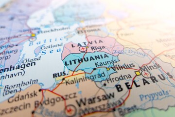 Map of Lithuania with flare from top right corner. Selective focus on label, close-up view