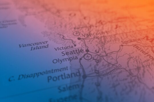 Map of Seattle made in orange and blue gradient. Selective focus on label, close-up view