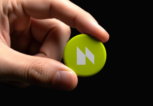 Realistic Button Badge Mockup in Hand